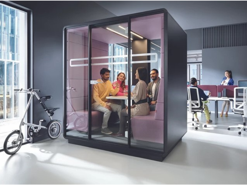 Hush Office four person meeting pod being used in a collaborative office space